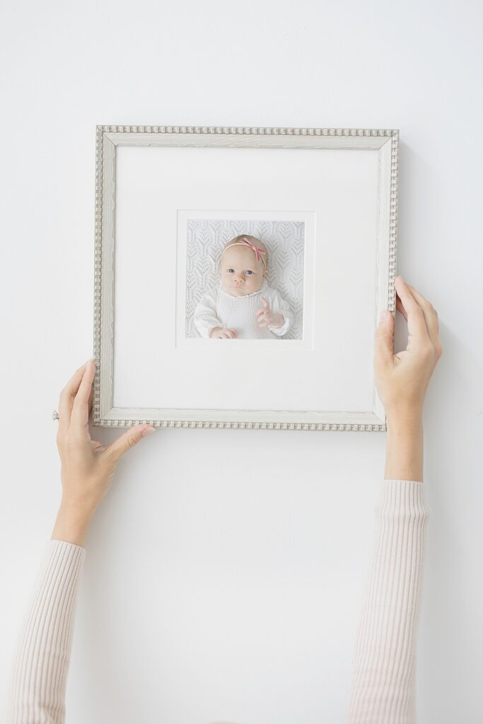An image of carefully curated heirloom wall art, highlighting the significance of selecting the right photographer to capture and immortalize precious moments with depth and emotion.